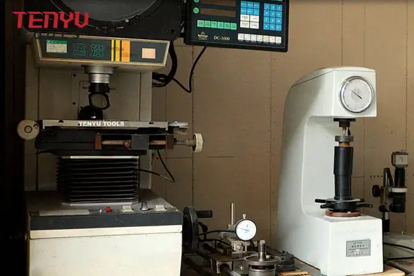 Quality control technician using precision measuring equipment