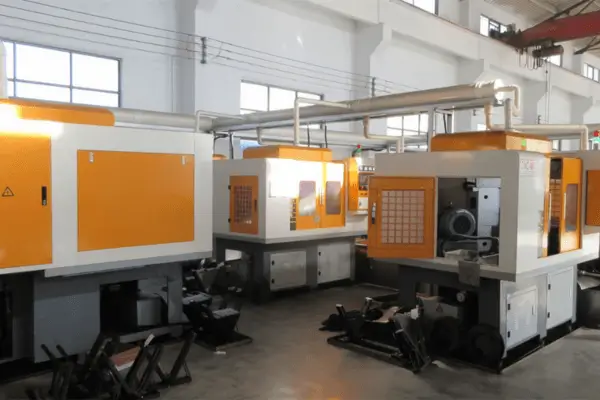 Close-up of CNC grinding machine shaping HSS drill bits