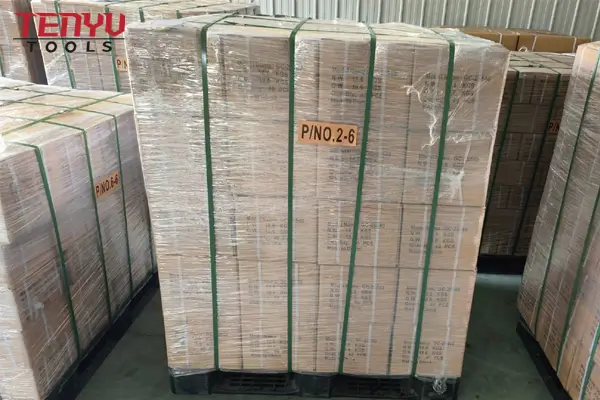 Pallets of packaged saw blades ready for international export