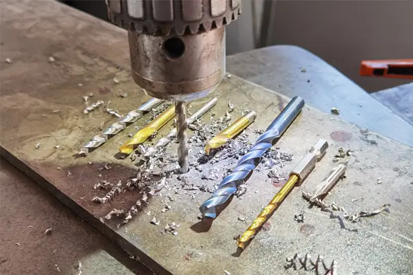 How to drill a hole bigger than your drill bit using the correct drilling tools